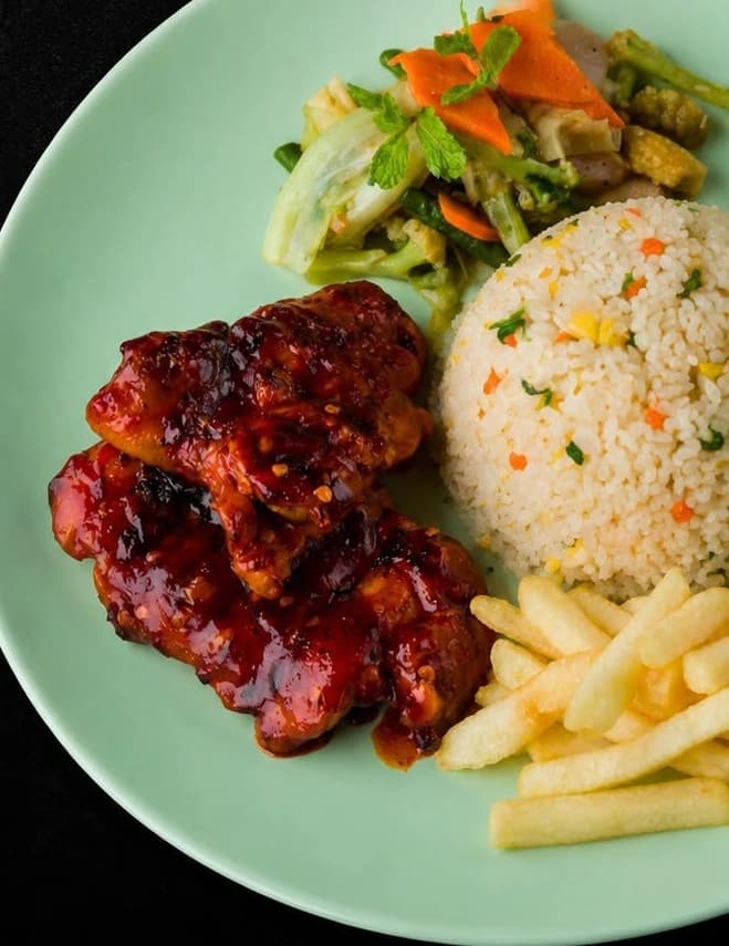 Mexican Chicken: glazed grilled chicken with fried rice, vegetables and chips